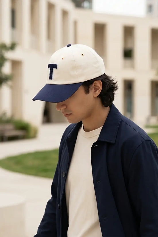 Bold "T" Varsity Baseball Cap — Cream / Navy