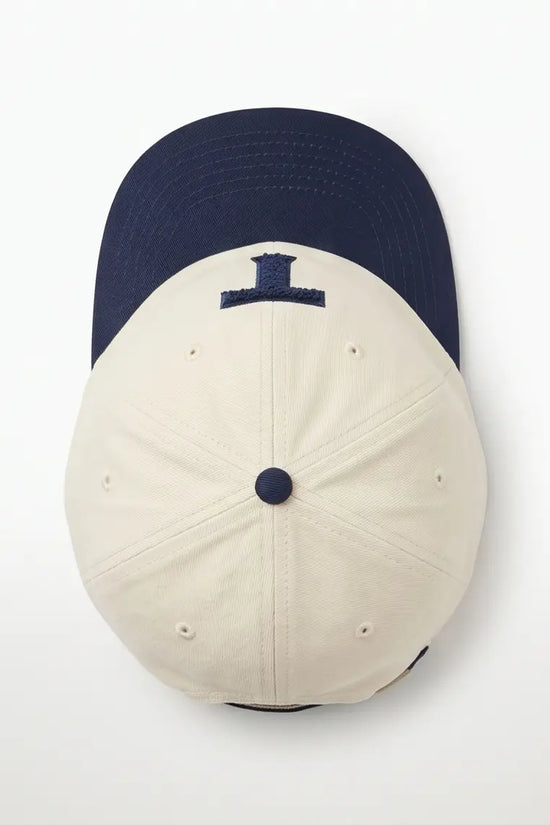 Bold "T" Varsity Baseball Cap — Cream / Navy