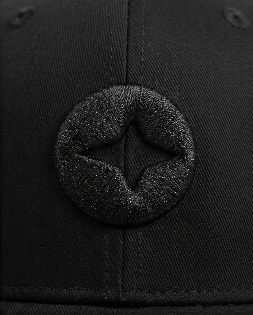 All-Black Cap with Circular Emblem Badge