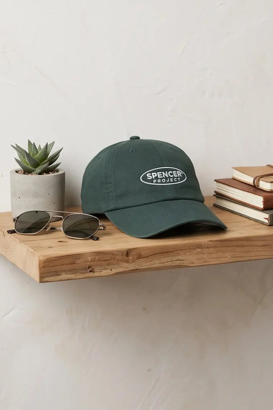 Spencer Project® Oval Logo Embroidered Baseball Cap – Forest Green