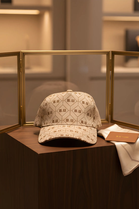 Beige Patterned Baseball Cap with “S.U” Logo