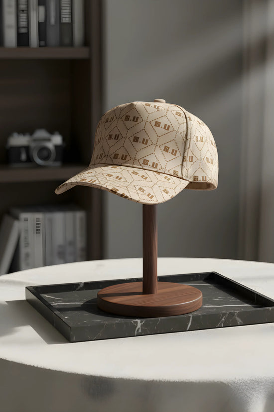 Beige Patterned Baseball Cap with “S.U” Logo