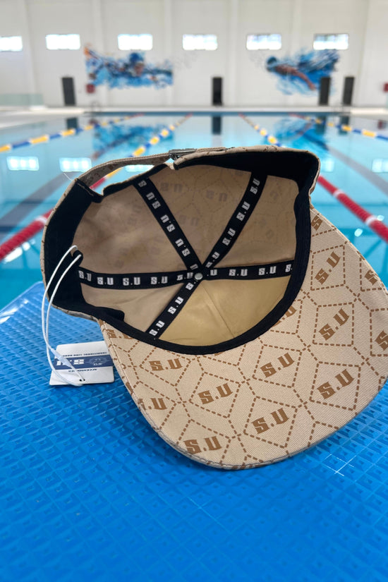 Beige Patterned Baseball Cap with “S.U” Logo